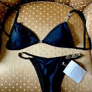 Size small never worn. Black bikini